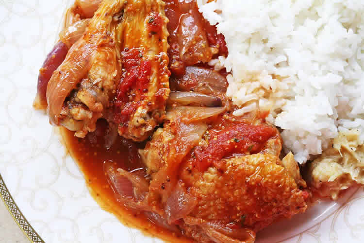 Poulet au tomates oignons et curry